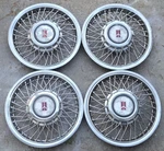 Set Of Oem 1987-96 Oldsmobile Cutlass Ciera 14" Wire Spoke Hubcap Wheel Covers. Fixed Price $149.99.