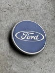 2005-08 Ford Focus & 2010-12 Taurus Wheel Rim Center Hub Cover Cap 97BG 1000 Ad. Fixed Price $39.95.