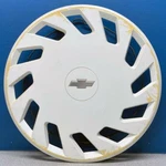 One 1987-1988 Chevrolet Spectrum # 3189 13" White Hubcap / Wheel Cover 94439074. Fixed Price $9.99.