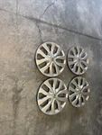 4 Steel Rims And Wheel Hub Caps Of Nissan Rogue (08-2016). Fixed Price $50.00.