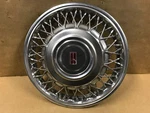 1986-1988 Oldsmobile Wire Spoke Hubcap/wheel Cover 14". Fixed Price $59.95.