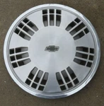 Vtg 1987 1988 Chevy Beretta Hubcap 12508499 14" 21-SLOT Wheel Cover. Fixed Price $12.95.