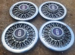 Set Of Oem 1983-1986 Mercury Marquis Ford Wire Spoke 14" Hubcaps Wheel Covers. Fixed Price $99.99.