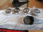 Four Vintage New Panasport G7 Center Caps & Tool W85H10. Fixed Price $145.00.
