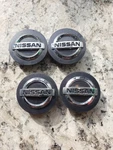 Nissan Altima Maxima Murano + Center Cap Set Of 4, 1997-2019 P/n 40342 ZM70B. Fixed Price $49.99.