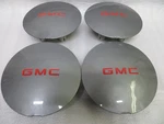 Gmc S15 Jimmy Sonoma 1994-1997 Gray / Red Emblem Center Caps Set 15661027. Fixed Price $150.00.