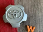 #w 1) 2006-2012 Toyota RAV4 Silver Steel Wheel Center Cap 69506 4260B-0R010. Fixed Price $15.50.