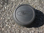 One Factory Original Ford Transit Black Center Hubcap 86VB-1130-BE. Fixed Price $19.80.