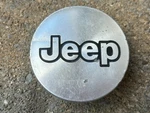 Jeep Grand Cherokee Wrangler Oem Wheel Center Cap 1999-2004 5CF97TRM 5CF97L3X. Fixed Price $8.95.