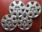 2000-2007 Ford Taurus Hubcaps 16" Wheel Covers 7027 YF1Z-1130-AC Set Of Four. Fixed Price $79.99.