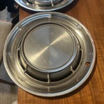 1957 Pontiac Hubcaps Vintage 14 Inch Set Of 2. Fixed Price $50.00.