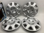 Cosmetic Scuffs Futura KT895-14SL 14" Universal Wheel Cover Set #2. Fixed Price $27.86.