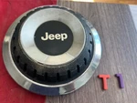 #T1 (1) 1984-1991 Jeep Cherokee Wrangler Wagoneer Center Cap SF8952-000-154 Oem. Fixed Price $29.95.