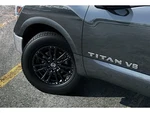 Genuine Nissan Wheel Caps Black 40342-EZ00A. Fixed Price $49.73.