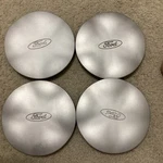 99 Ford Taurus Oem Center Hub Cap Silver 3179 F6DC1A096AA F6DC-1A096-AA 4PCS. Fixed Price $50.00.