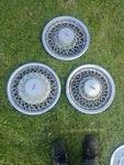 Three Factory 1979 1980 Oldsmobile Tornado Wire Spoke 15 Inch Hubcap. Fixed Price $100.00.