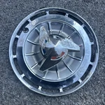 1962 Chevrolet Impala 14 Red White Blue Spinner Hubcap Wheel Cover. Fixed Price $25.00.