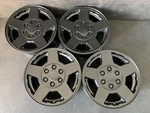 (4) Chevrolet Tahoe Silverado Suburban Black Powder Coat Wheels Rims + Caps 17". Fixed Price $595.00.