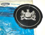 Genuine Ford Wheel Center Cap / Applique Nos E0MY-1137-C. Fixed Price $14.95.