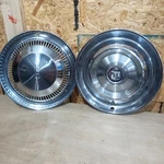 Vintage Mercury & Oldsmobile Hubcaps 2PC Lot Wall Art Craft Clock Decor Dog Dish. Fixed Price $19.99.