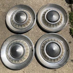 Set Factory 1974 1976 Chrysler New Yorker 15 Inch Deluxe Hubcap Wheel Cover. Fixed Price $125.00.