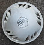 Single Used Mercury Sable (89-91) 14" Hubcap, E94C-1130-AC. Fixed Price $25.00.