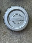 1999-2004 Nissan Frontier Pickup 40343-78410 Oem Silver Wheel Center Rim Cap. Fixed Price $19.99.