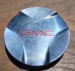 Gmc Envoy, Xl, Center Cap, 2006-2009 Part # 9595877 01 Damaged. Fixed Price $24.95.