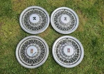 Set Of 4 1980-1990 Oldsmobile 15" Locking Wire Spoke Wheel Covers Hubcaps Rwd. Fixed Price $139.00.