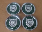 New Jaguar Wheel Emblem Badge Set Of 4PCS Silver Head Green Background MNA6249AB. Fixed Price $69.95.