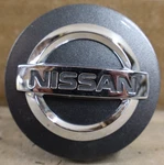 Oem Used Nissan Medium Grey Center Cap 40342ZM70B 403429N040 40342JF00A. Fixed Price $9.95.