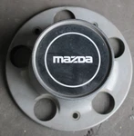 Mazda Series Oem Center Hub Cap Without Screws F17A-1A096-AA. Fixed Price $19.80.