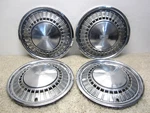 1974 1976 Mercury Montego Oem 15" Hubcap / Wheel Cover Set D4GY-1130-S #2FL-12. Fixed Price $50.00.