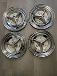 1956 Oldsmobile Spinner Hubcaps Set Of Four. Nice Used.. Fixed Price $299.00.