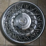 Oem 1975-1985 Cadillac Fleetwood Brougham 15" Wire Spoke Hubcap Wheel Cover #DL1. Fixed Price $59.99.