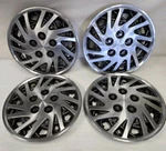 1993-95 Chrysler Lebaron Dodge Caravan 14INCH Hub Caps Oem Mopar. Fixed Price $105.00.