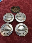 Set Of Nissan Altima Sentra Versa Maxima Rogue Wheel Center Caps 40343-AU51A. Fixed Price $26.12.