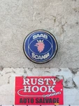 2000 Saab 93 Center Cap 4566311 PA66-M30. Fixed Price $10.00.