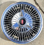 (one) Vintage Oldsmobile 14 Inch Wire Spoke Three Bar Spinner Hubcap Oem Rare. Fixed Price $120.00.
