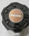 Mazda B2600 4X4 Center Cap For Rear Wheels Front 2WD Trucks. Fixed Price $40.45.