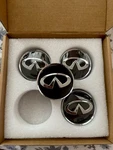 Infiniti Original Black Floating Wheel Hub Center Caps 63MM. Fixed Price $69.31.