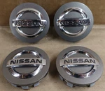 Oem Used Set Nissan Light Grey Center Caps 40342ZM70B 403429N040 40342JF00A. Fixed Price $39.95.