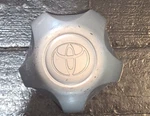 Toyota Tundra Sequoia Silver Center Cap Part # S303-10 X1834147-9SF WCA-201. Fixed Price $22.25.