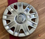 #k (1) 2004-2011 Mercury Grand Marquis Chrome Hubcap Center 5W33-1130-AA. Fixed Price $109.95.