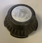 Nissan Datsun Oem Center Hub Cap Black 40317M7360. Fixed Price $24.00.