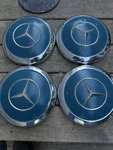 Mercedes Benz Set Of Blue Color Key Hubcaps. Fixed Price $350.00.
