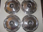 4- 1969 Dodge Dart Full Wheel Covers Hubcaps 13IN. P/n: 2881795.. Fixed Price $75.00.