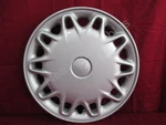 Nos Oem Plymouth Breeze 14" 20-HOLE Wheel Cover 1996 97 Silver Sparkle. Fixed Price $19.95.