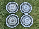 Set Of 1968 Oldsmobile F85 Cutlass 14" Wire Spoke Wheel Covers Hubcaps. Fixed Price $109.00.