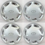 Genuine Hyundai Sonata # 55529 14" 7 Spoke Hubcaps Wheel Covers Used SET/4. Fixed Price $49.99.